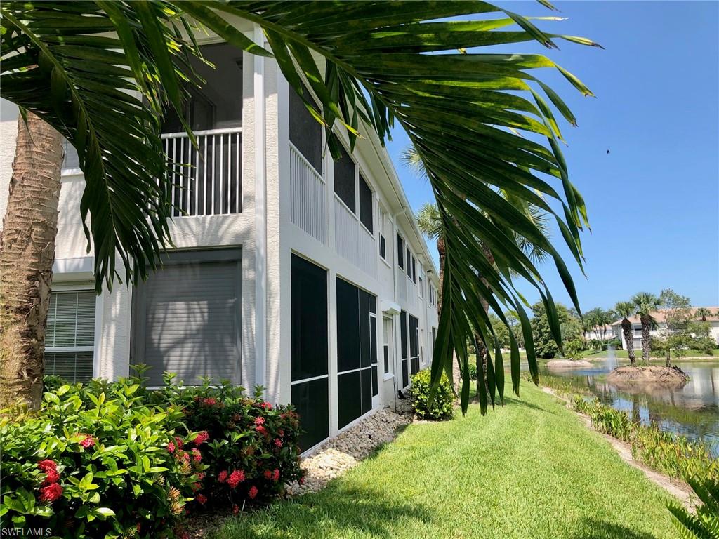 6879 Redbay Park Road, Unit 203 Naples, FL 34109 - Photo 4 of 34 a view of small garden