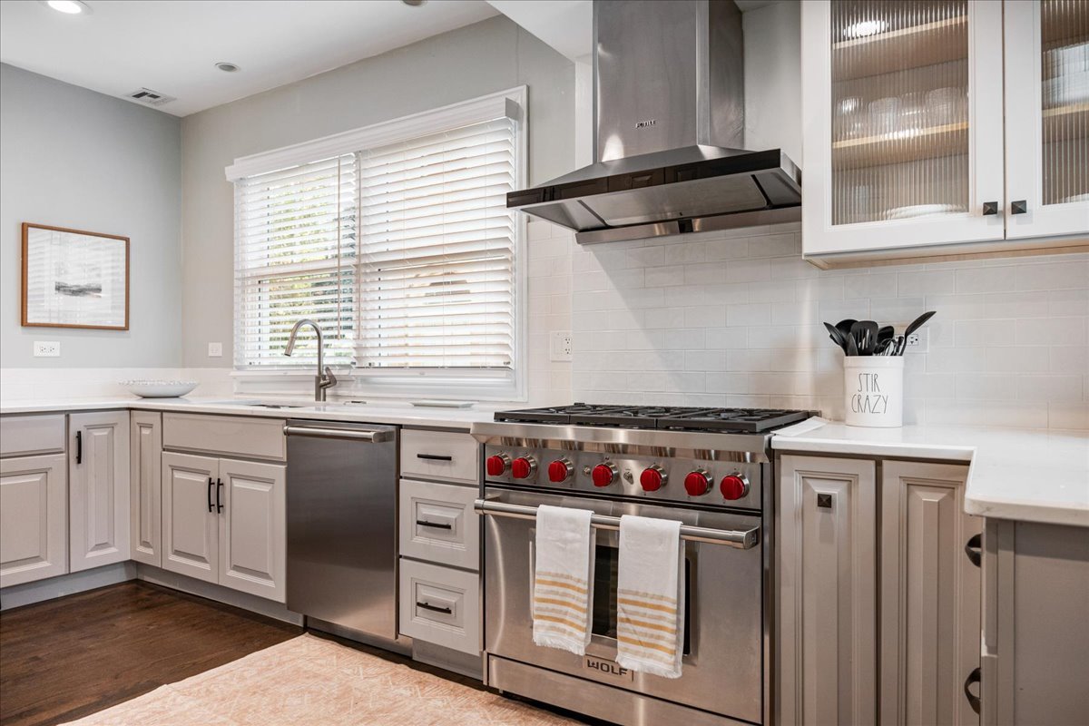 924 Chestnut Avenue Wilmette, IL 60091 - Photo 12 of 41 a kitchen with stainless steel appliances granite countertop a stove and a sink