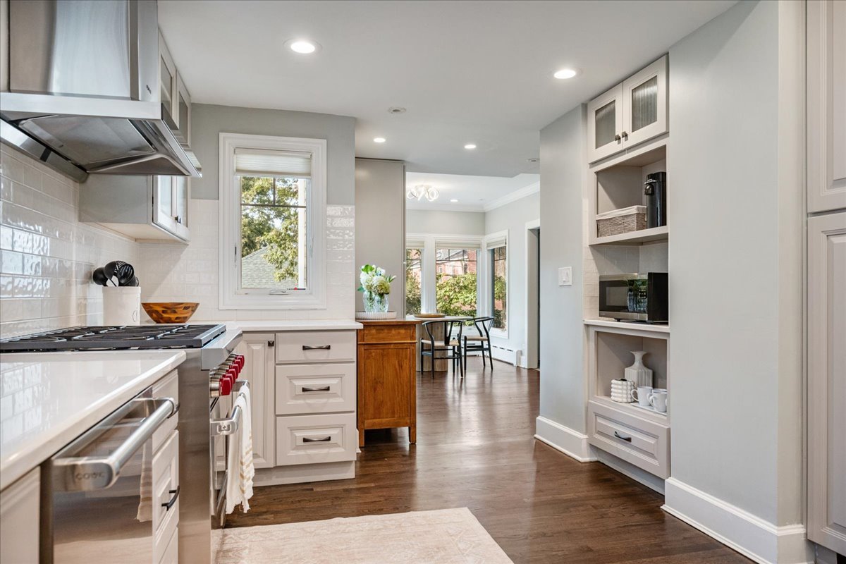 924 Chestnut Avenue Wilmette, IL 60091 - Photo 13 of 41 a kitchen with stainless steel appliances granite countertop a stove and a refrigerator
