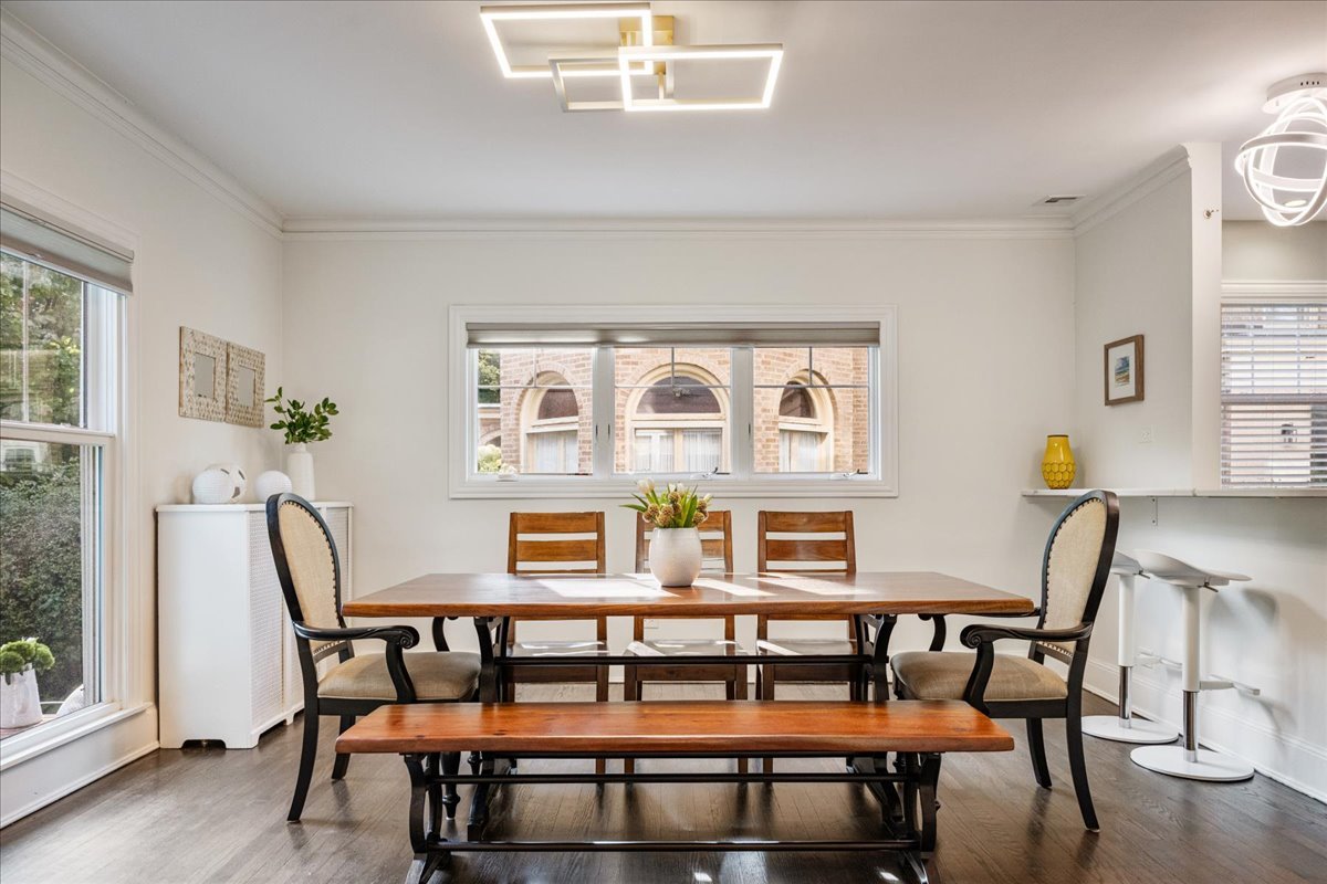 924 Chestnut Avenue Wilmette, IL 60091 - Photo 15 of 41 a dining room with furniture a window and wooden floor