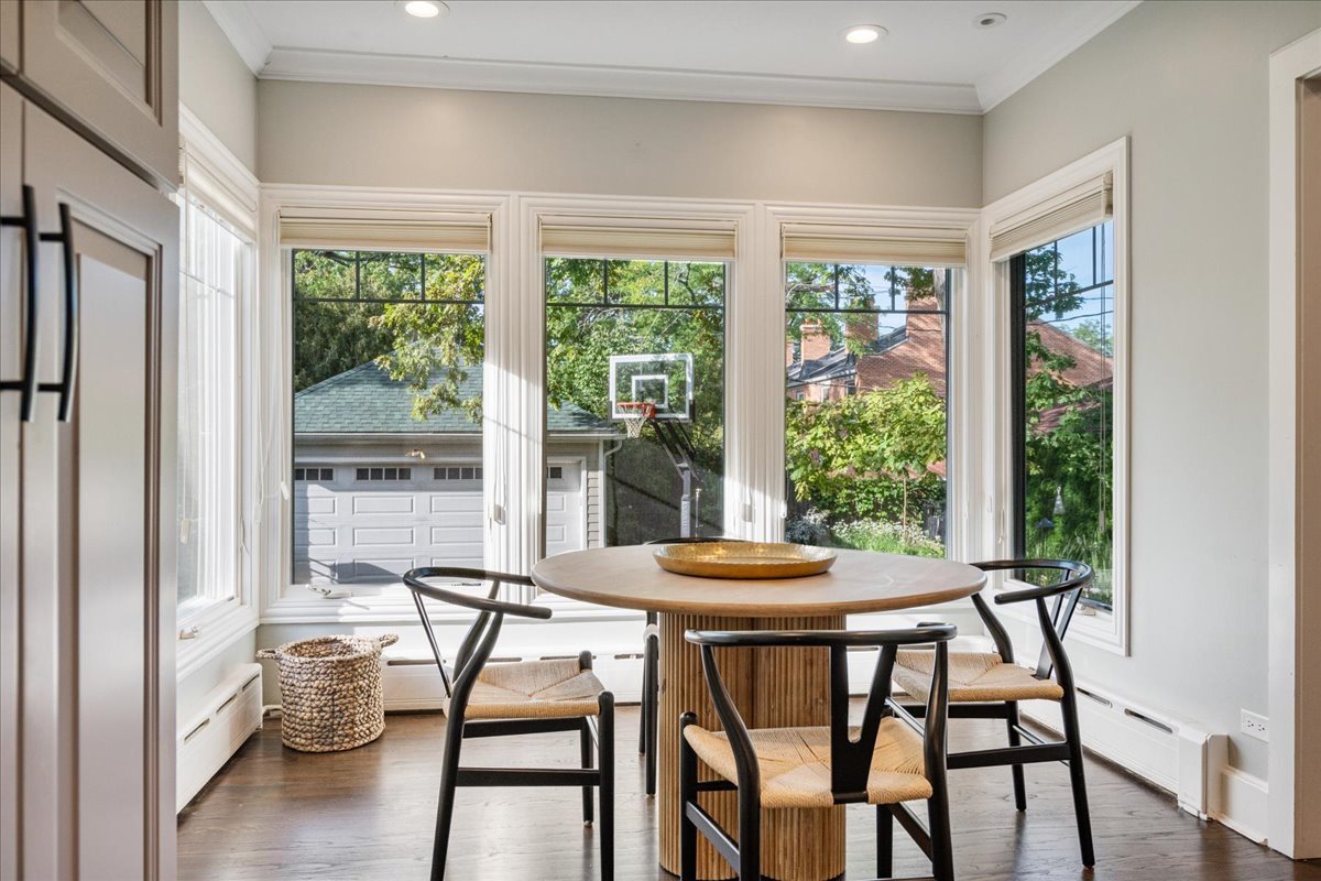 924 Chestnut Avenue Wilmette, IL 60091 - Photo 18 of 41 a dining room with furniture and wooden floor
