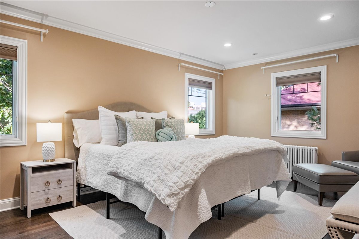 924 Chestnut Avenue Wilmette, IL 60091 - Photo 20 of 41 a bedroom with a bed and a dresser next to a window