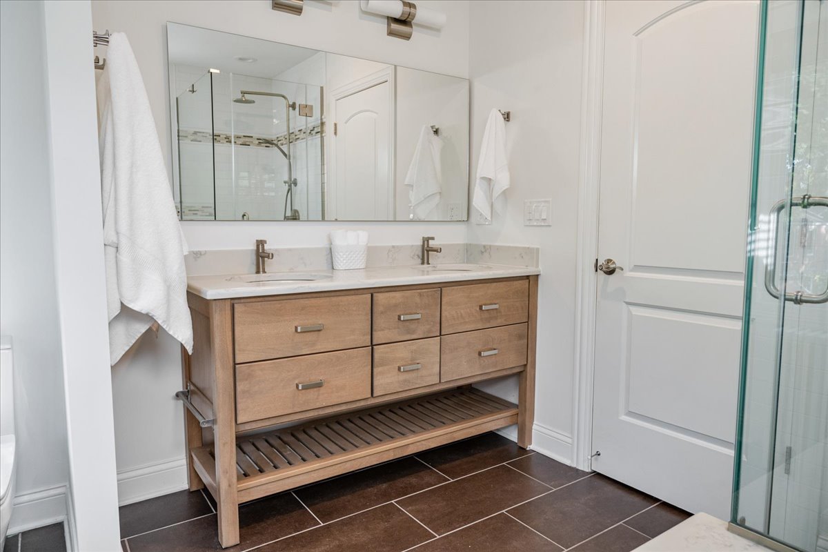 924 Chestnut Avenue Wilmette, IL 60091 - Photo 21 of 41 a bathroom with a double vanity sink mirror and