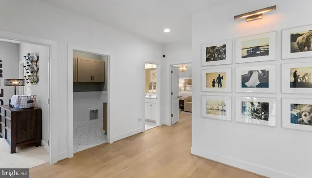 a view of a big room with shelves and wooden floor
