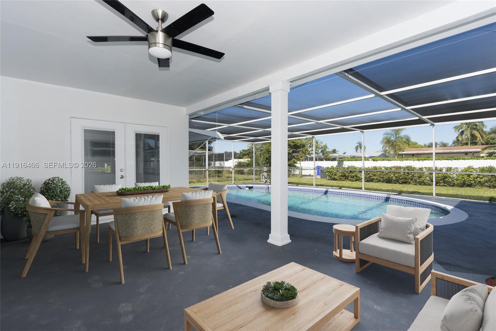 a outdoor space with furniture a window and a fireplace
