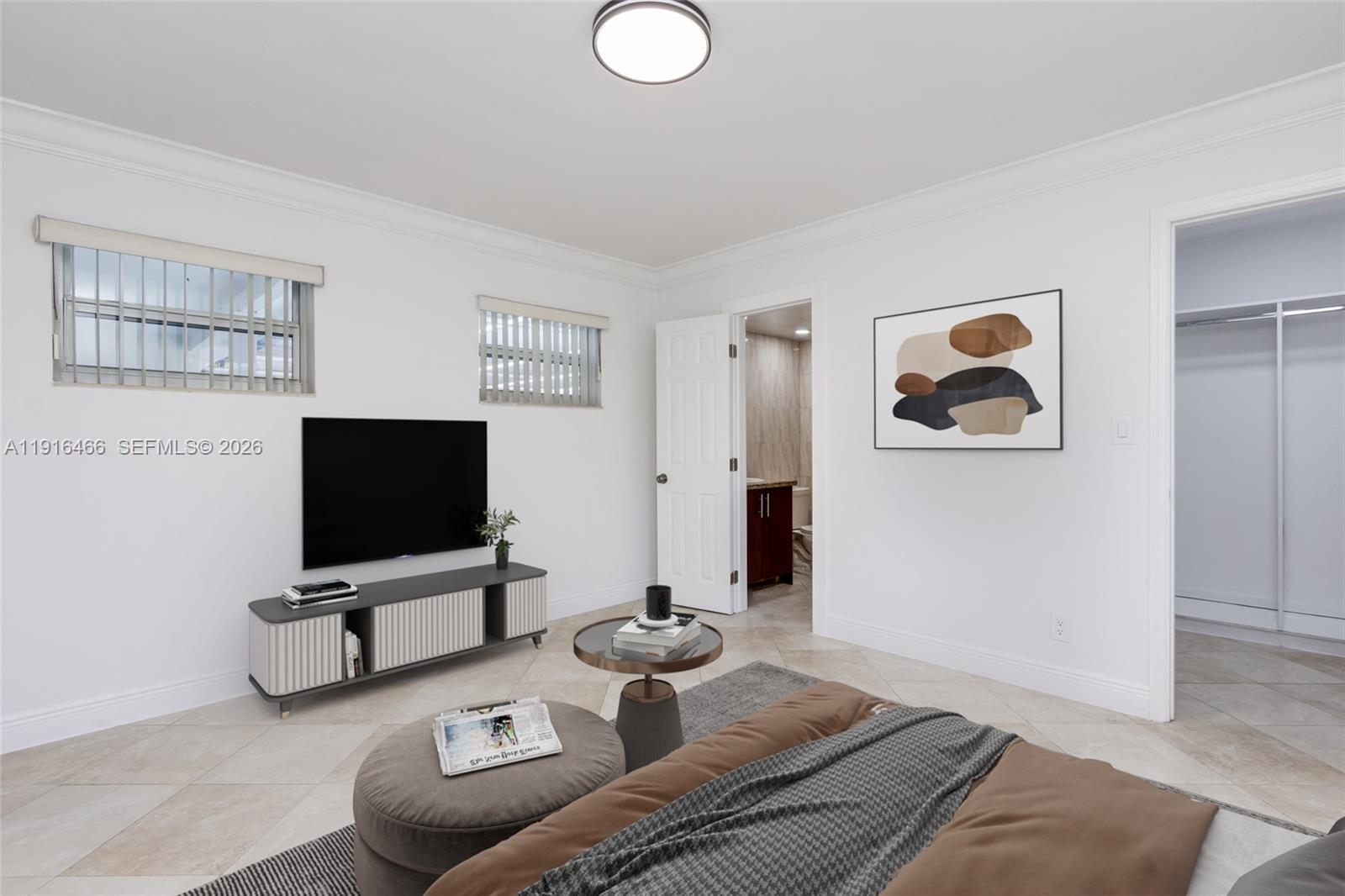 5425 Madison Street Hollywood, FL 33021 - Photo 22 of 45 a living room with furniture and a flat screen tv