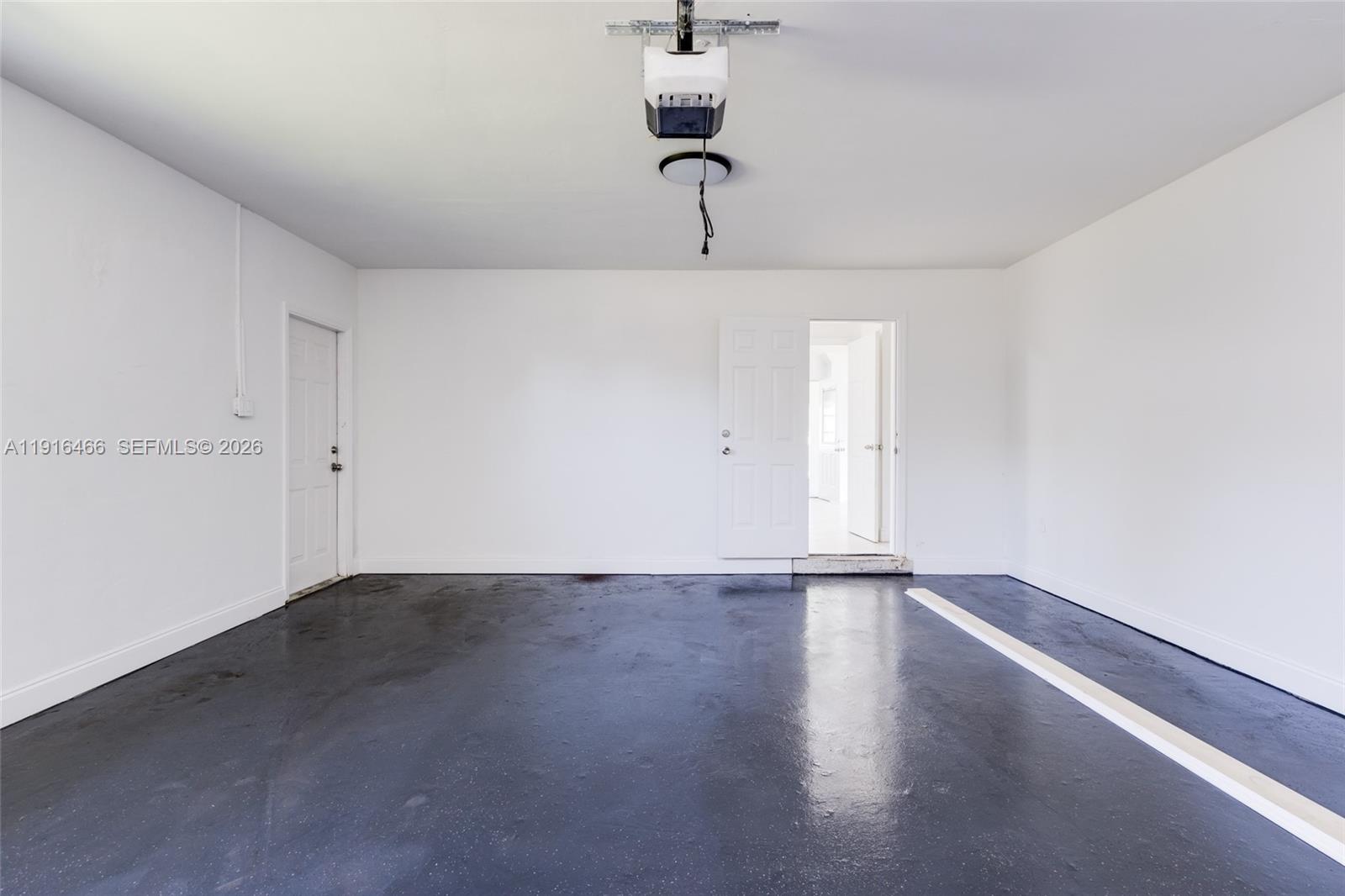 5425 Madison Street Hollywood, FL 33021 - Photo 28 of 45 a view of an empty room with a window