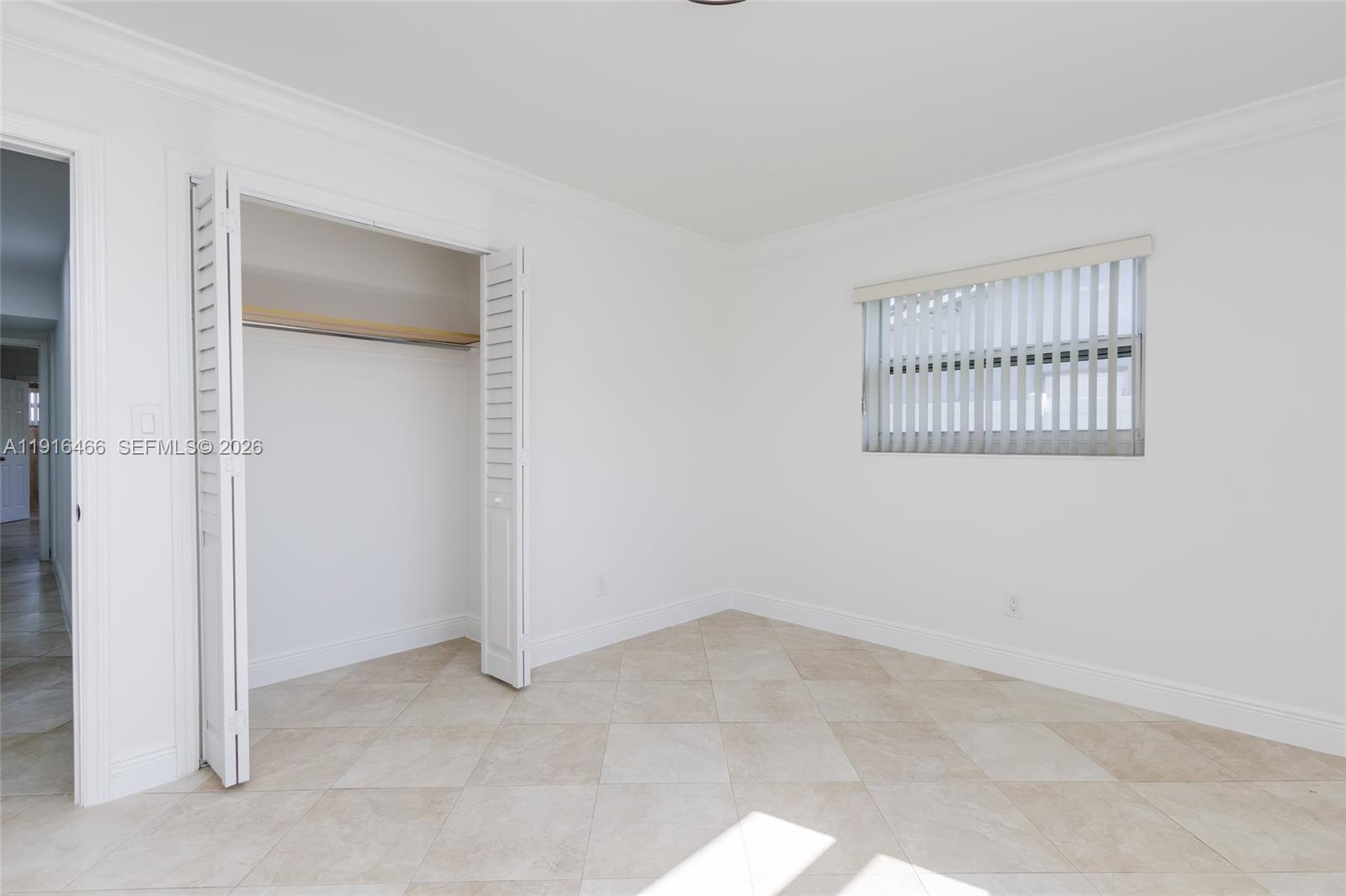 5425 Madison Street Hollywood, FL 33021 - Photo 39 of 45 an empty room with windows