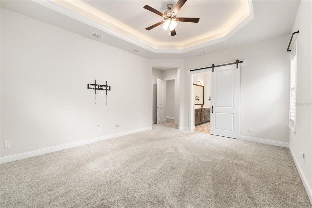 11081 Southwest 38th Boulevard Gainesville, FL 32608 - Photo 21 of 66 a view of an empty room with a window