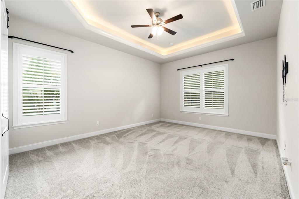11081 Southwest 38th Boulevard Gainesville, FL 32608 - Photo 23 of 66 a view of an empty room with a window