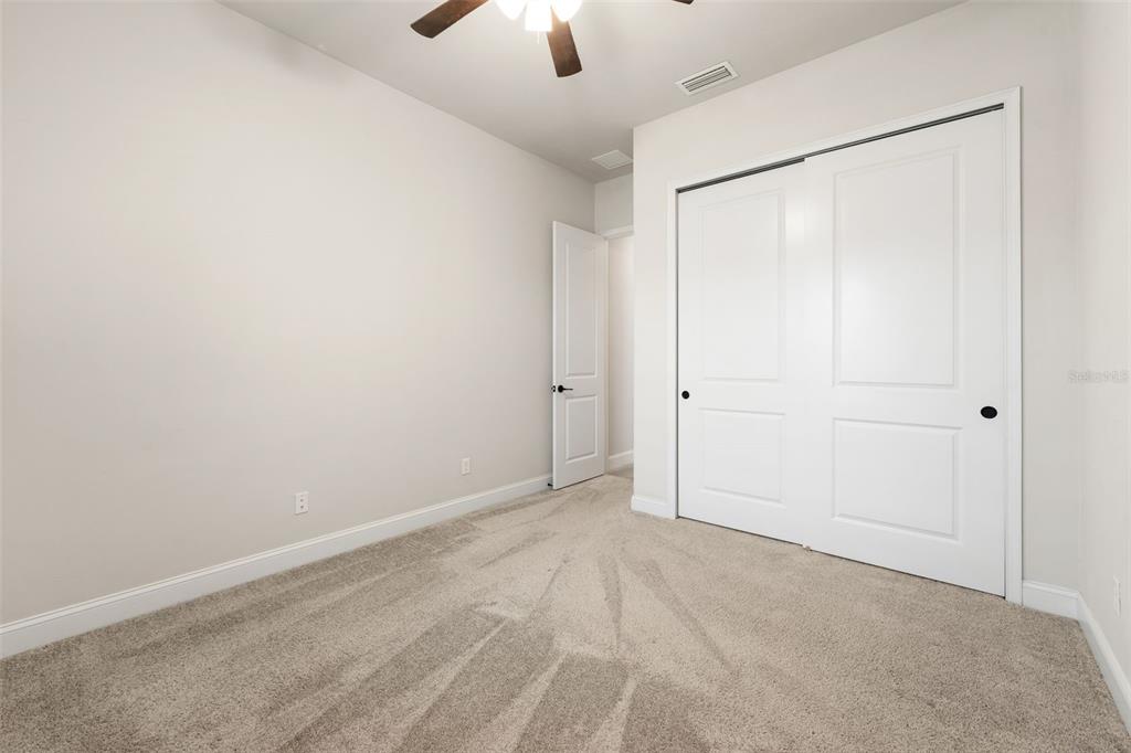 11081 Southwest 38th Boulevard Gainesville, FL 32608 - Photo 28 of 66 wooden floor in an empty room
