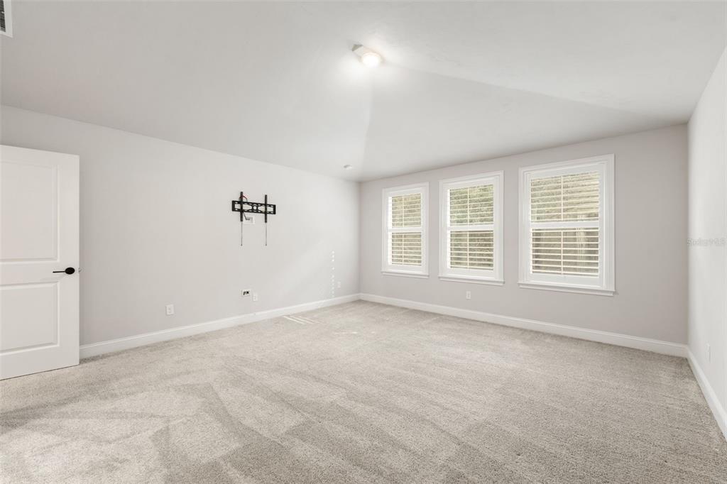 11081 Southwest 38th Boulevard Gainesville, FL 32608 - Photo 35 of 66 a view of an empty room with a window