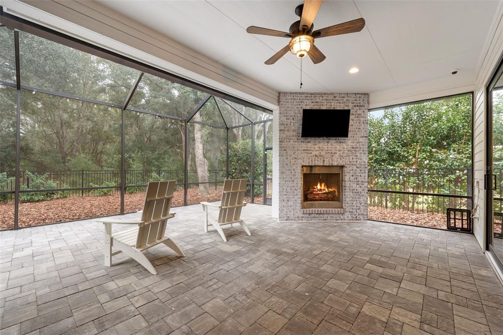 11081 Southwest 38th Boulevard Gainesville, FL 32608 - Photo 45 of 66 a view of an empty room with a fireplace and a window