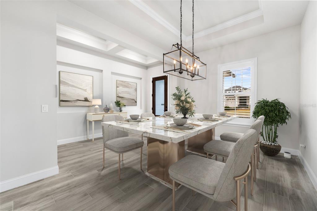 11081 Southwest 38th Boulevard Gainesville, FL 32608 - Photo 6 of 66 a view of a dining room and livingroom with furniture wooden floor a chandelier