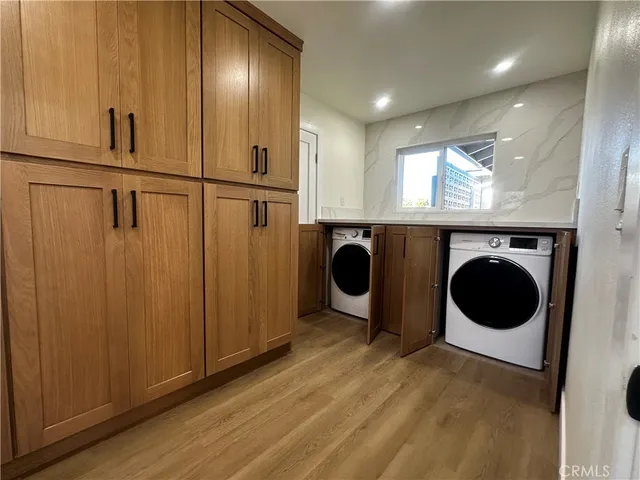 a view of a house with backyard porch and sitting area