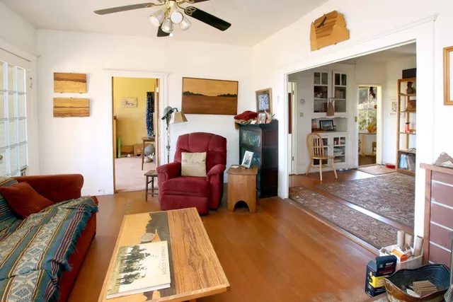 a view of a storage and utility room with washer and dryer