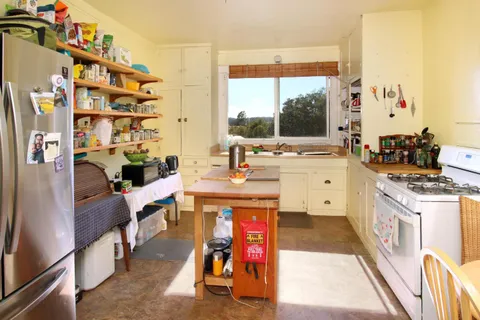 a room with furniture and a window