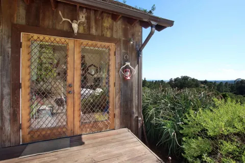 a bedroom with a bed and a view of bedroom