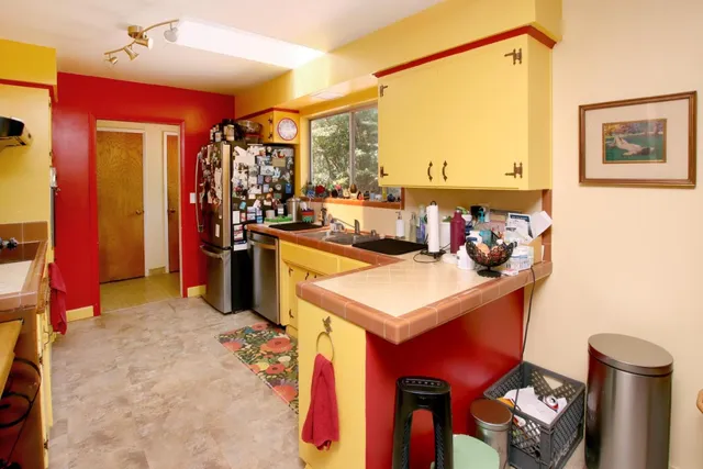 a view of balcony with wooden floor and outdoor seating