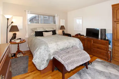 a view of a chairs and table in the patio