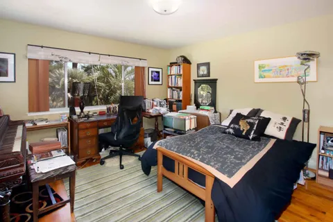 a backyard of a house with outdoor seating