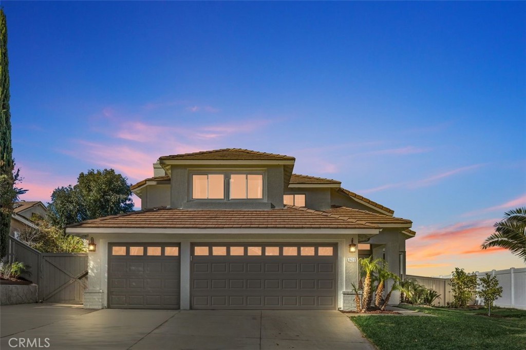 1420 San Ponte Road Corona, CA 92882 - Photo 1 of 1 a front view of a house with a yard