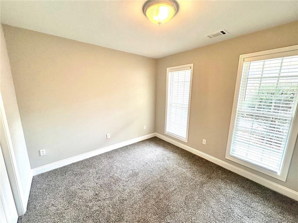 41 Oakmont Drive Southwest Rome, GA 30161 - Photo 18 of 21 a view of an empty room with a window