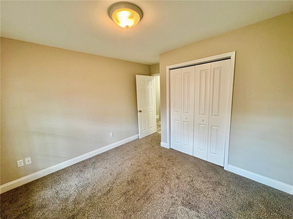 41 Oakmont Drive Southwest Rome, GA 30161 - Photo 19 of 21 an empty room with a natural light
