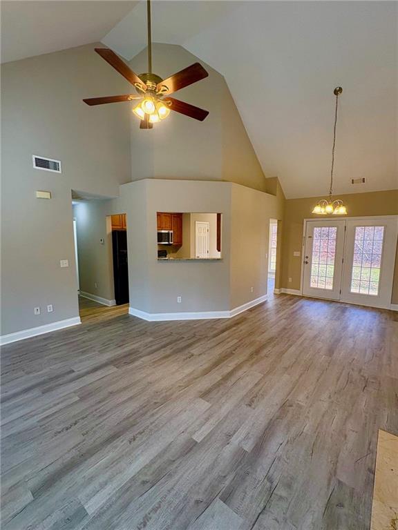 41 Oakmont Drive Southwest Rome, GA 30161 - Photo 6 of 21 a view of a livingroom with a ceiling fan window and wooden floor
