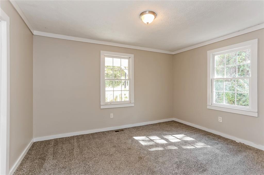 4179 Williamson Road Ellenwood, GA 30294 - Photo 11 of 25 an empty room with a window