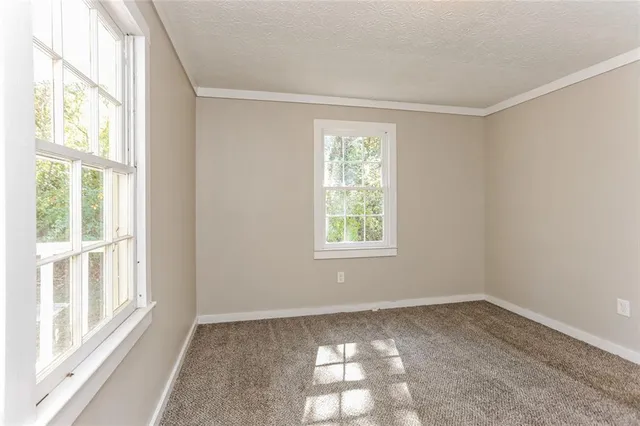 a view of a room that has a window in it