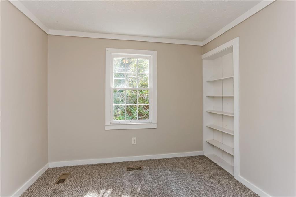 4179 Williamson Road Ellenwood, GA 30294 - Photo 14 of 25 an empty room with a window