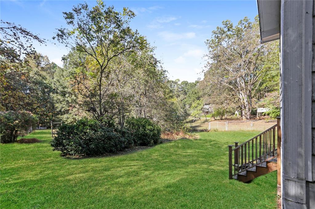 4179 Williamson Road Ellenwood, GA 30294 - Photo 24 of 25 a view of a park with large trees
