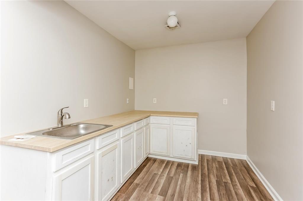 4179 Williamson Road Ellenwood, GA 30294 - Photo 10 of 25 a bathroom with a sink and a mirror