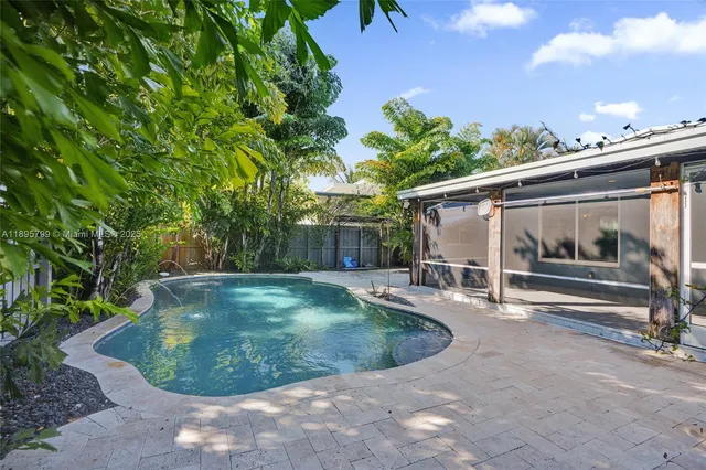 a view of a small house with roof