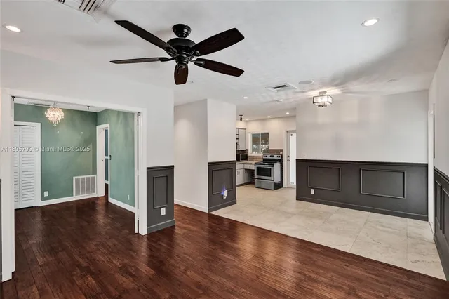 a view of a kitchen with a sink and a window