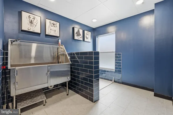 a view of an empty room with storage & utility