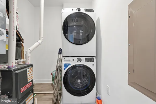 a utility room with dryer and washer