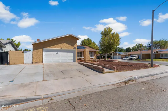 a view of street with houses