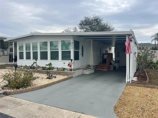 a front view of a house with patio