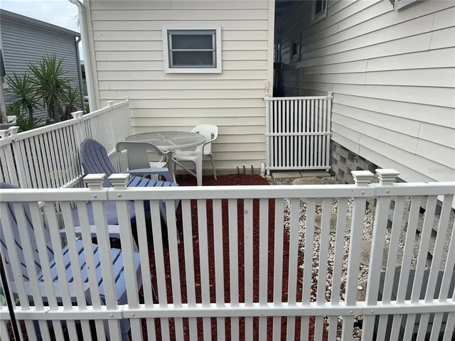 a view of a wooden roof deck