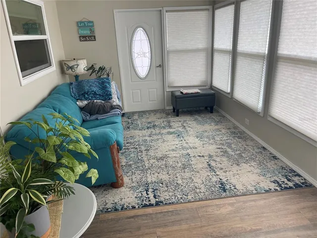 a living room filled with furniture
