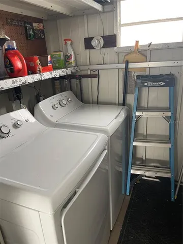 a utility room with dryer and washer