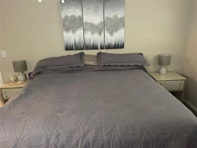a kitchen with stainless steel appliances a sink and a refrigerator