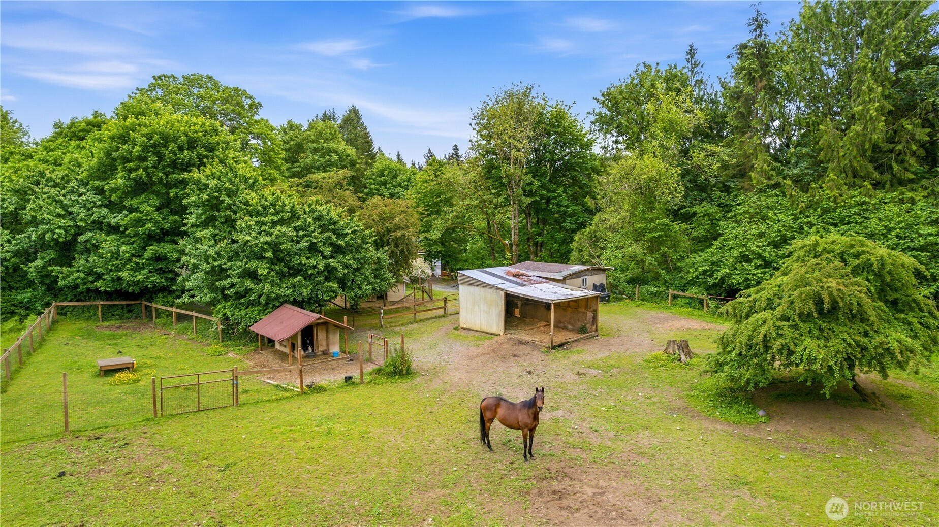 24522 Cromwell Road Monroe, WA 98272 - Photo 28 of 40 a view of a backyard with chairs