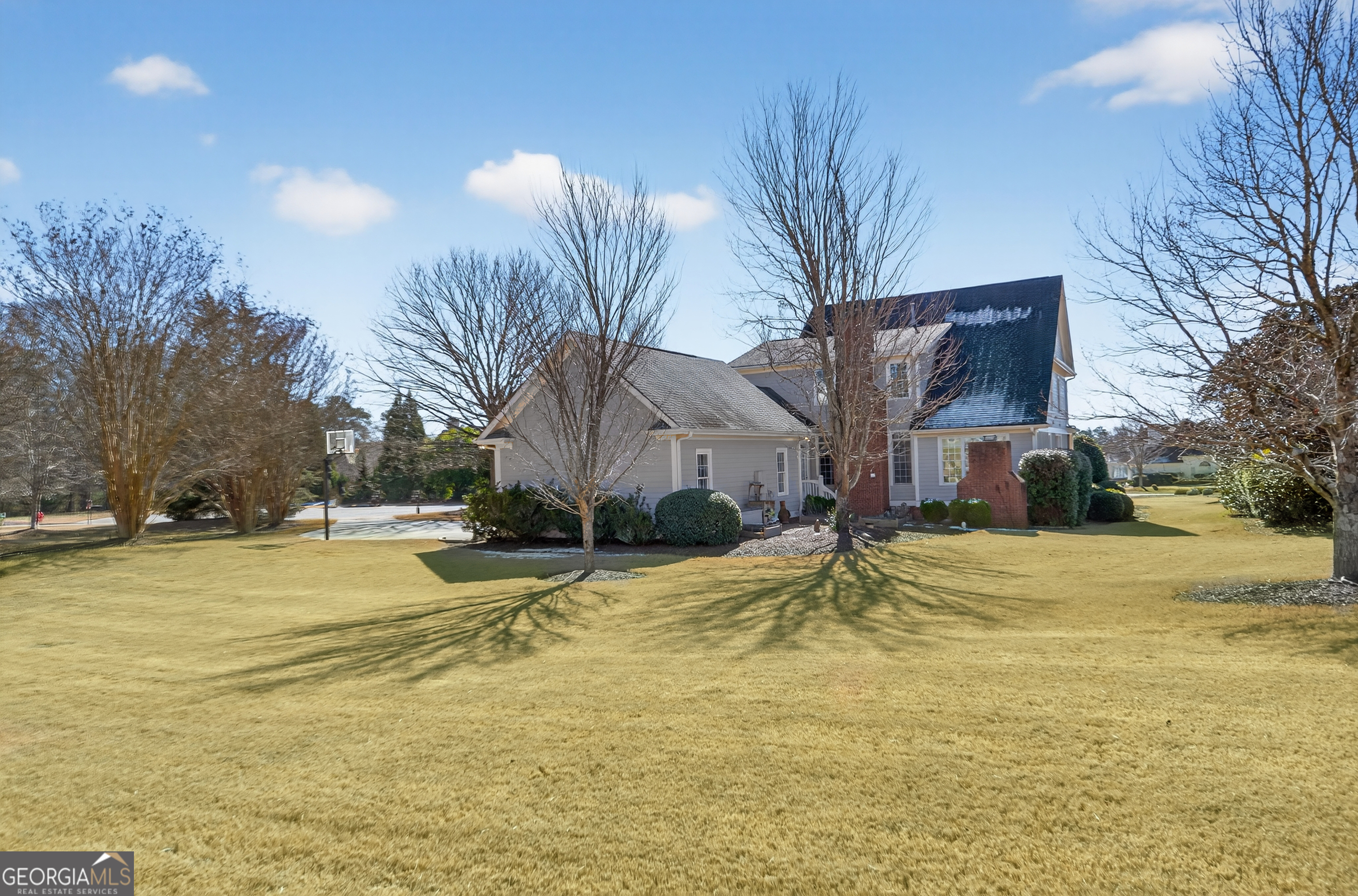 1000 Boxwood Place Madison, GA 30650 - Photo 63 of 75 a view of a swimming pool with an house and garden
