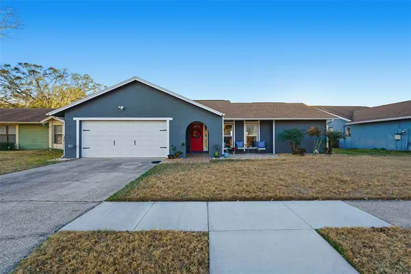front view of a house with a yard