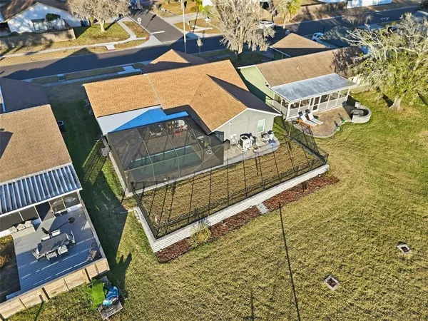 an aerial view of a house with a ocean view