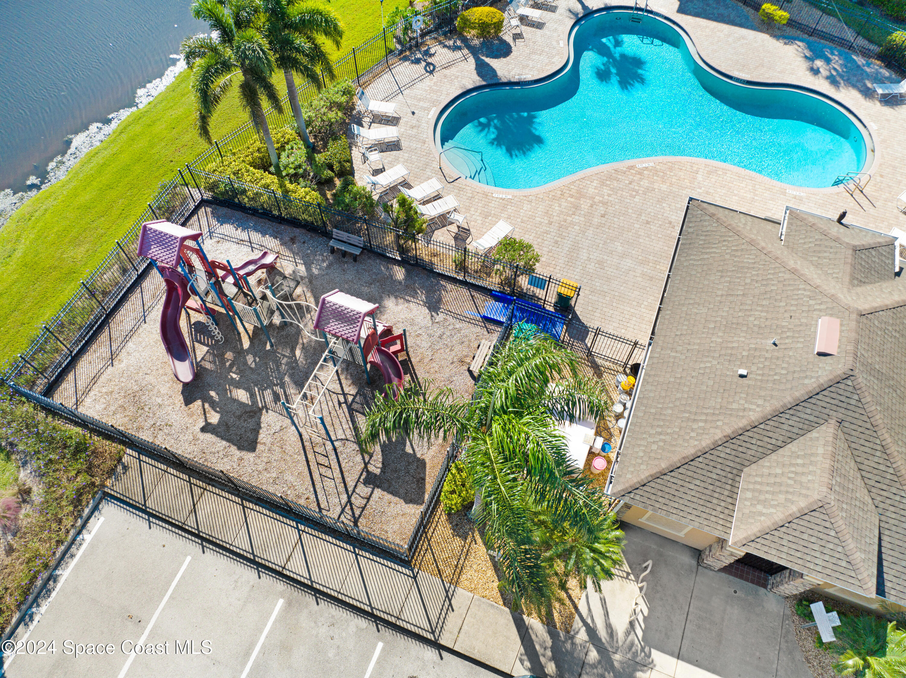 2785 Reston Street, Unit 103 Melbourne, FL 32935 - Photo 17 of 44 an aerial view of a swimming pool