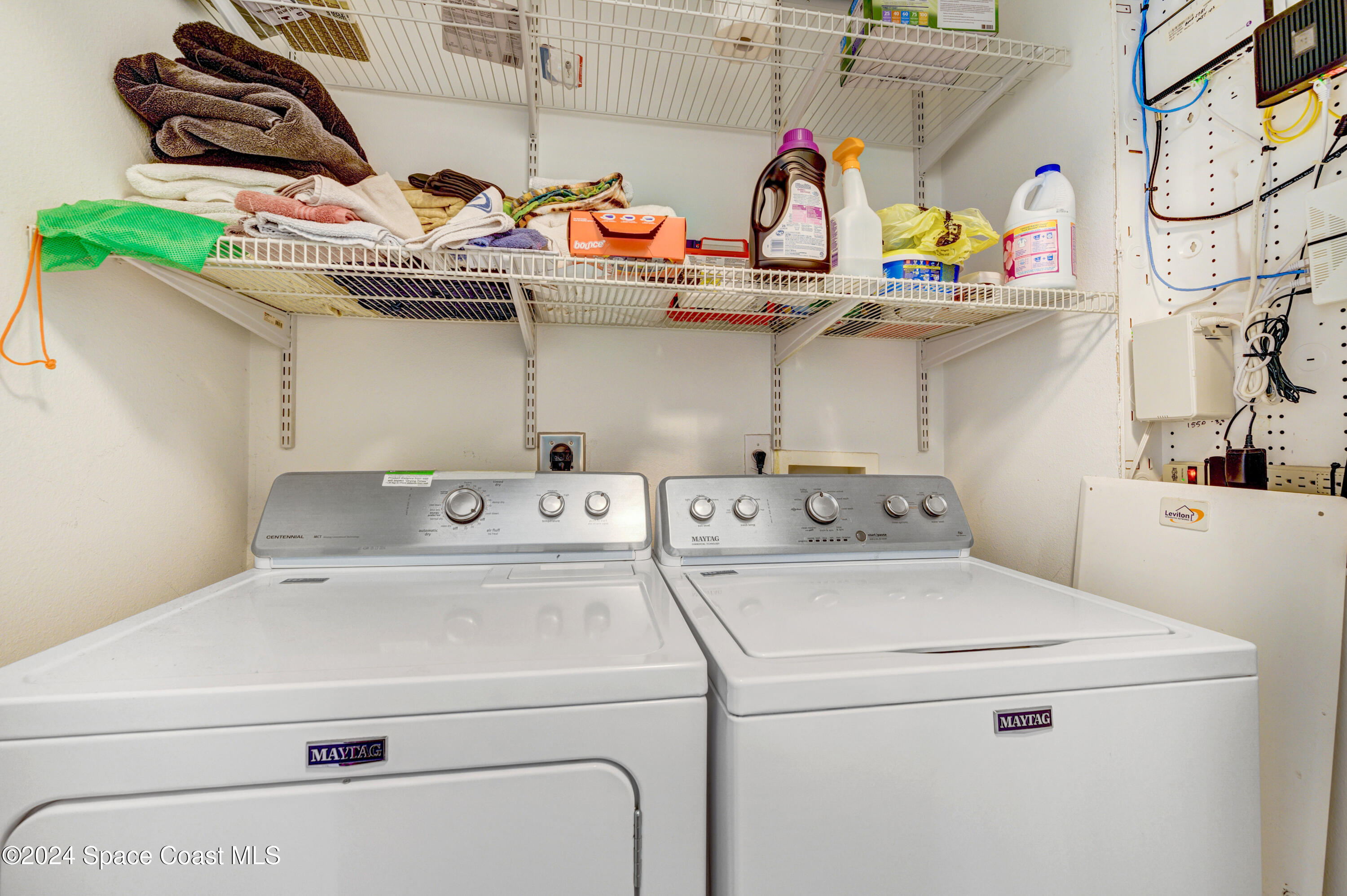 2785 Reston Street, Unit 103 Melbourne, FL 32935 - Photo 41 of 44 a utility room with dryer and washer